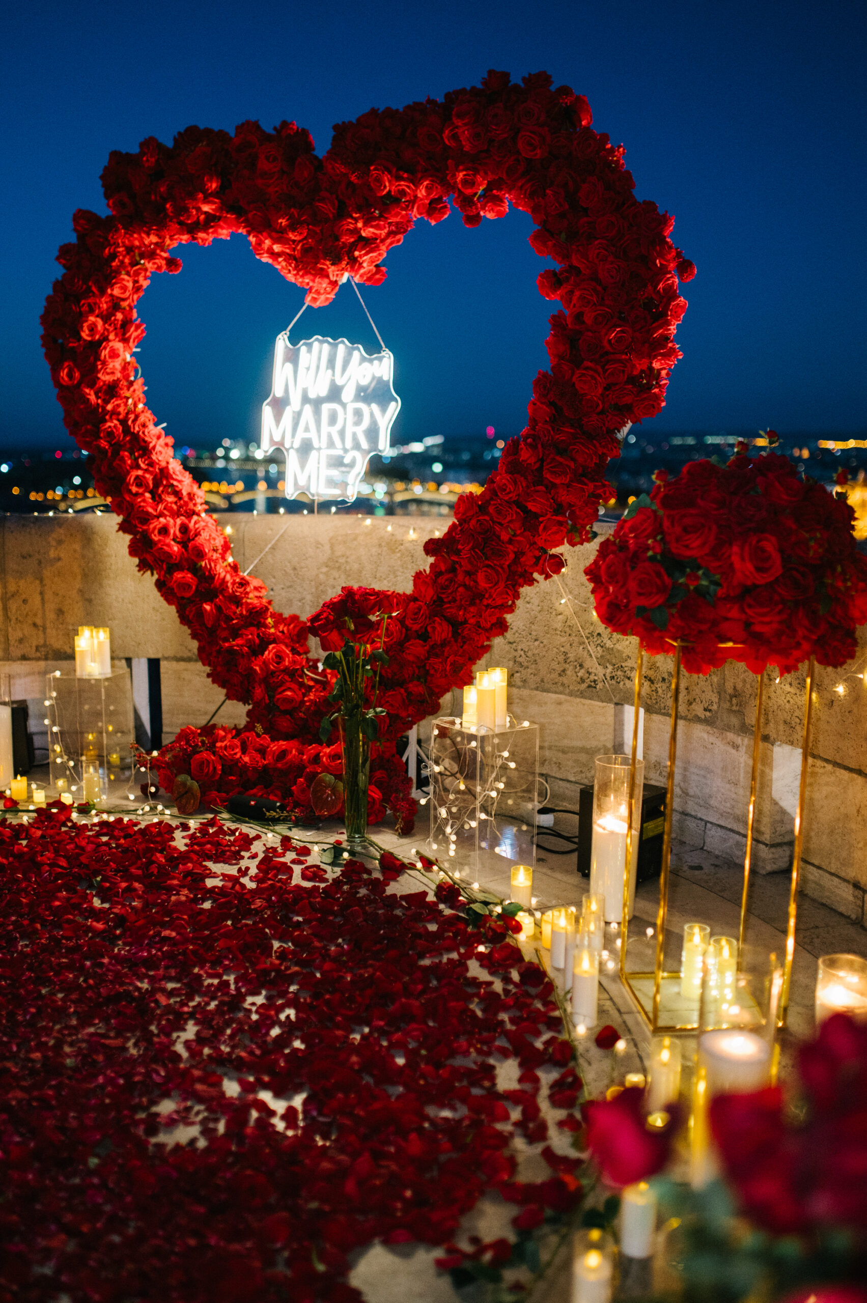 Rooftop marriage proposal with rose setup in Cluj-Napoca, Romania